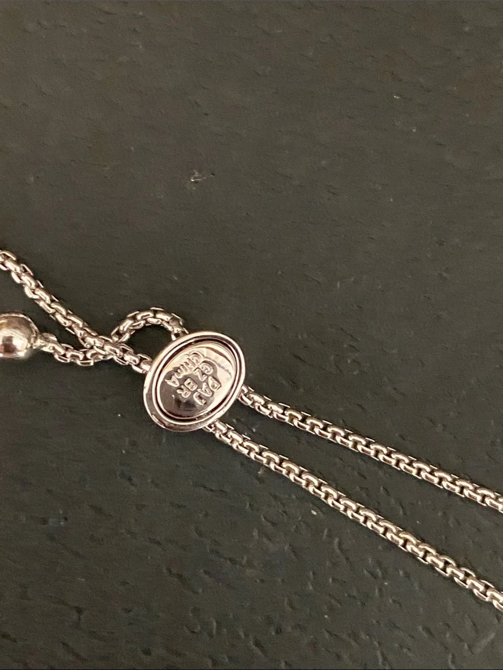 PAJ Sterling Silver Cross Bracelet with CZ stones and bronze hearts
